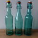 3 old green bottles