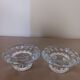 Moulded glass candle holders.