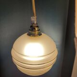 Frosted glass lamp with golden trims
