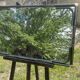 Vintage rectangular wall mirror in tubular metal and brass, 1970s/1980s.