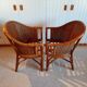 Set of 2 armchairs in adult varnished woven rattan
