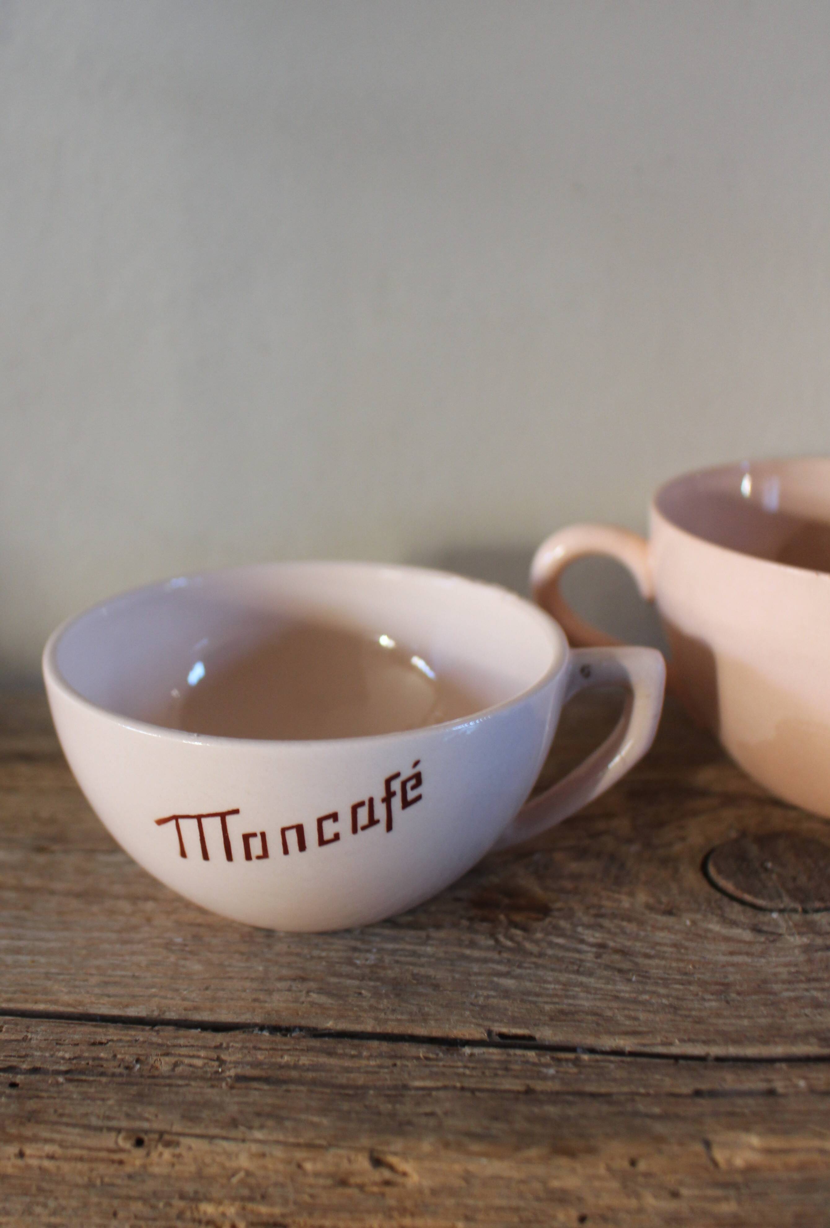 A set of 3 pink earthenware cups from Digoin Sarreguemines.