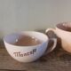 A set of 3 pink earthenware cups from Digoin Sarreguemines.