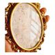 2 frames in gilded metal and curved glass