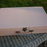 Pink wooden suitcase