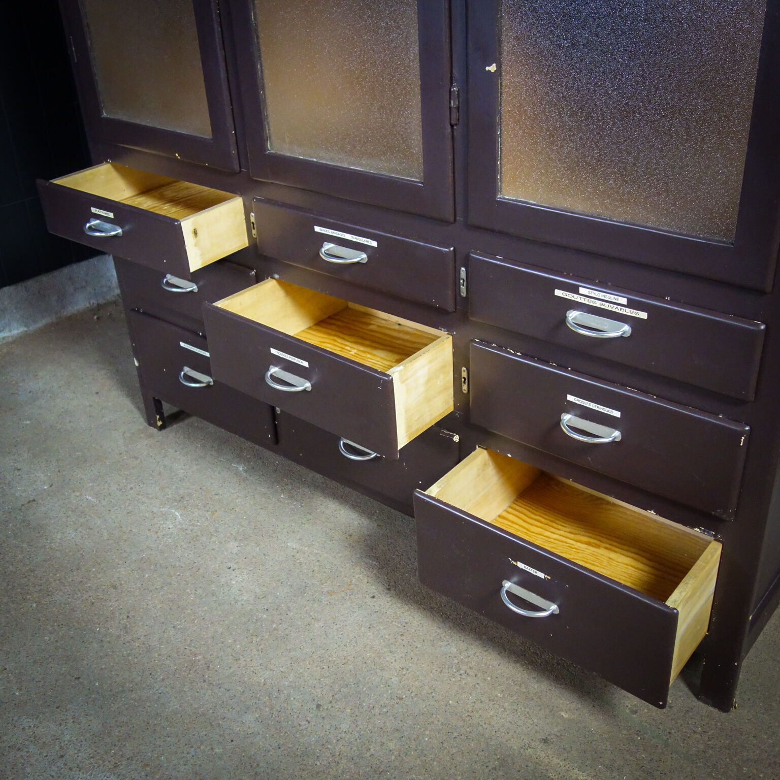 Medical display cabinet with drawers 1950