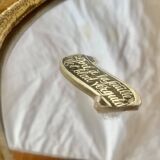 Old oval mirror in gilded resin - baroque style - 73 cm