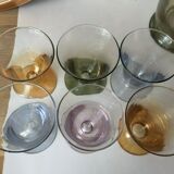 Aperitif liqueur service in iridescent glass on tray