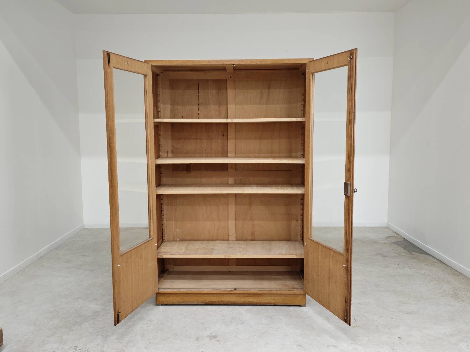 Oak glass-fronted school cabinet 1960