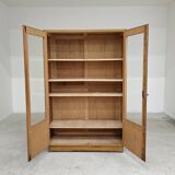 Oak glass-fronted school cabinet 1960