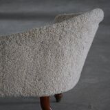 Antique Danish sculptural chaise longue from the 19th century, reupholstered in lambswool.