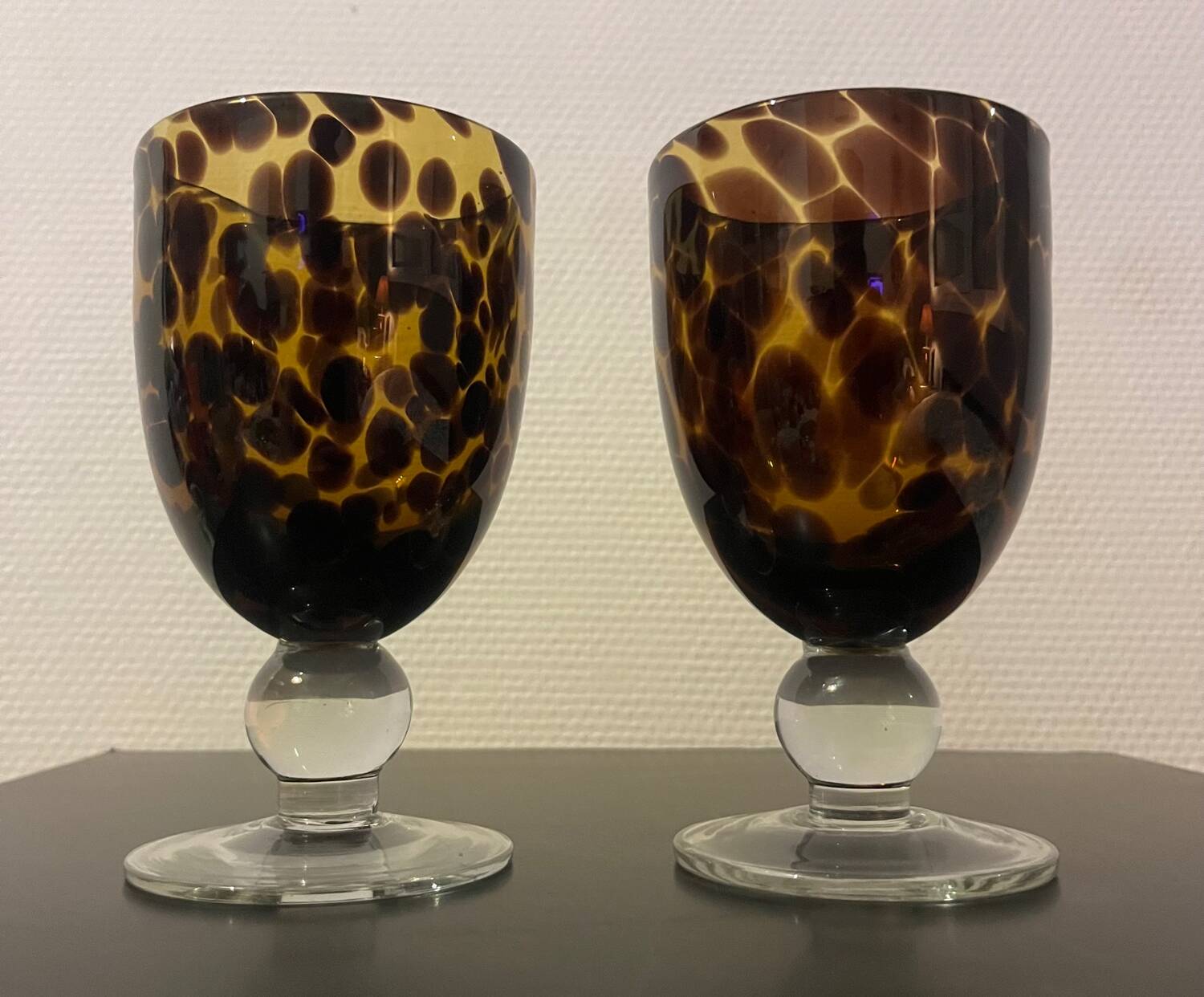 Duo of amber glass stemware