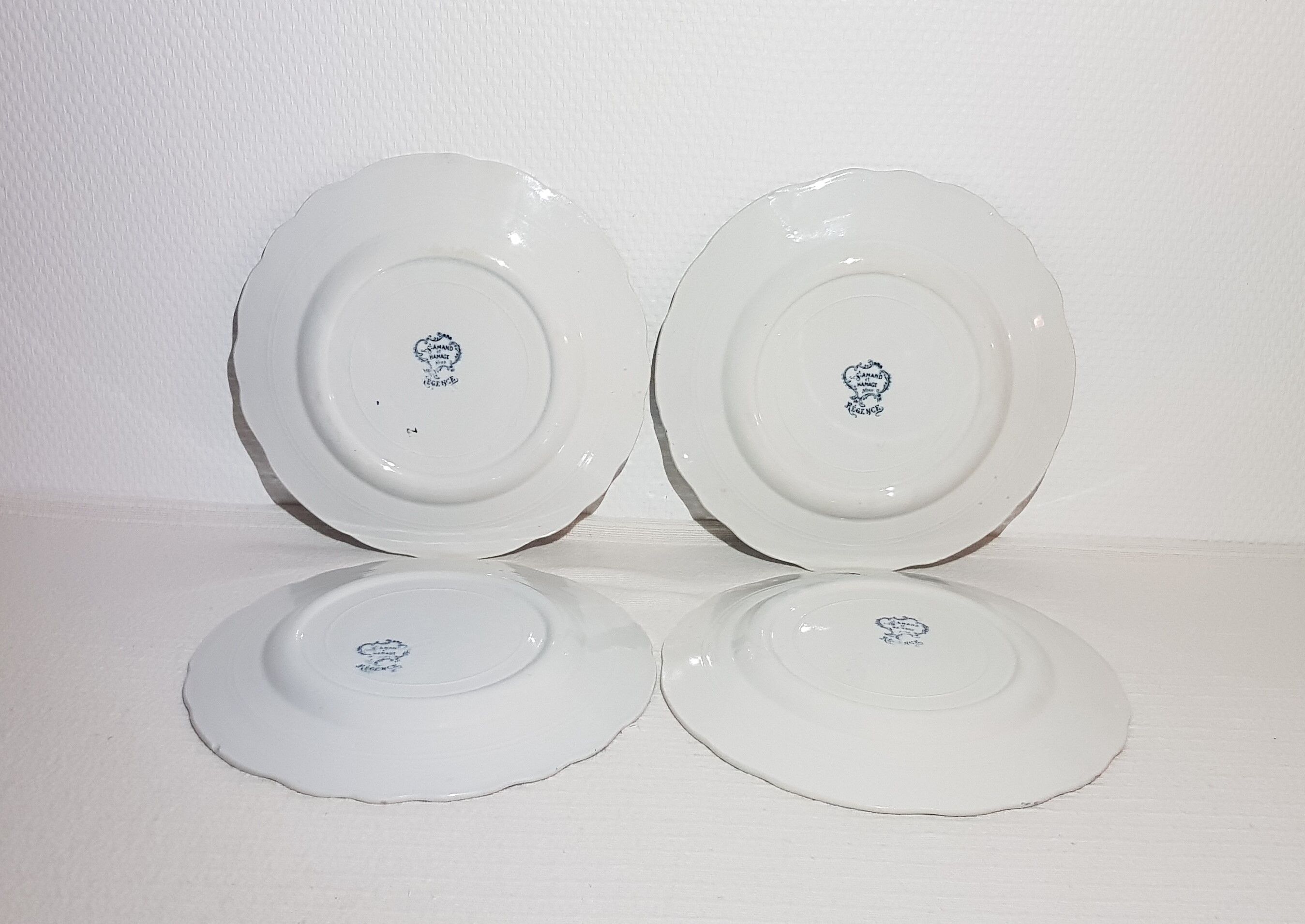 Set of 4 dessert plates in earthenware of St Amand model Regency, iron earth