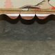 Antique banquette with cluster and ball feet, window seat in Mulberry Flying Ducks fabric.