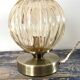 Lampe globe vintage doré électrifiée à neuf