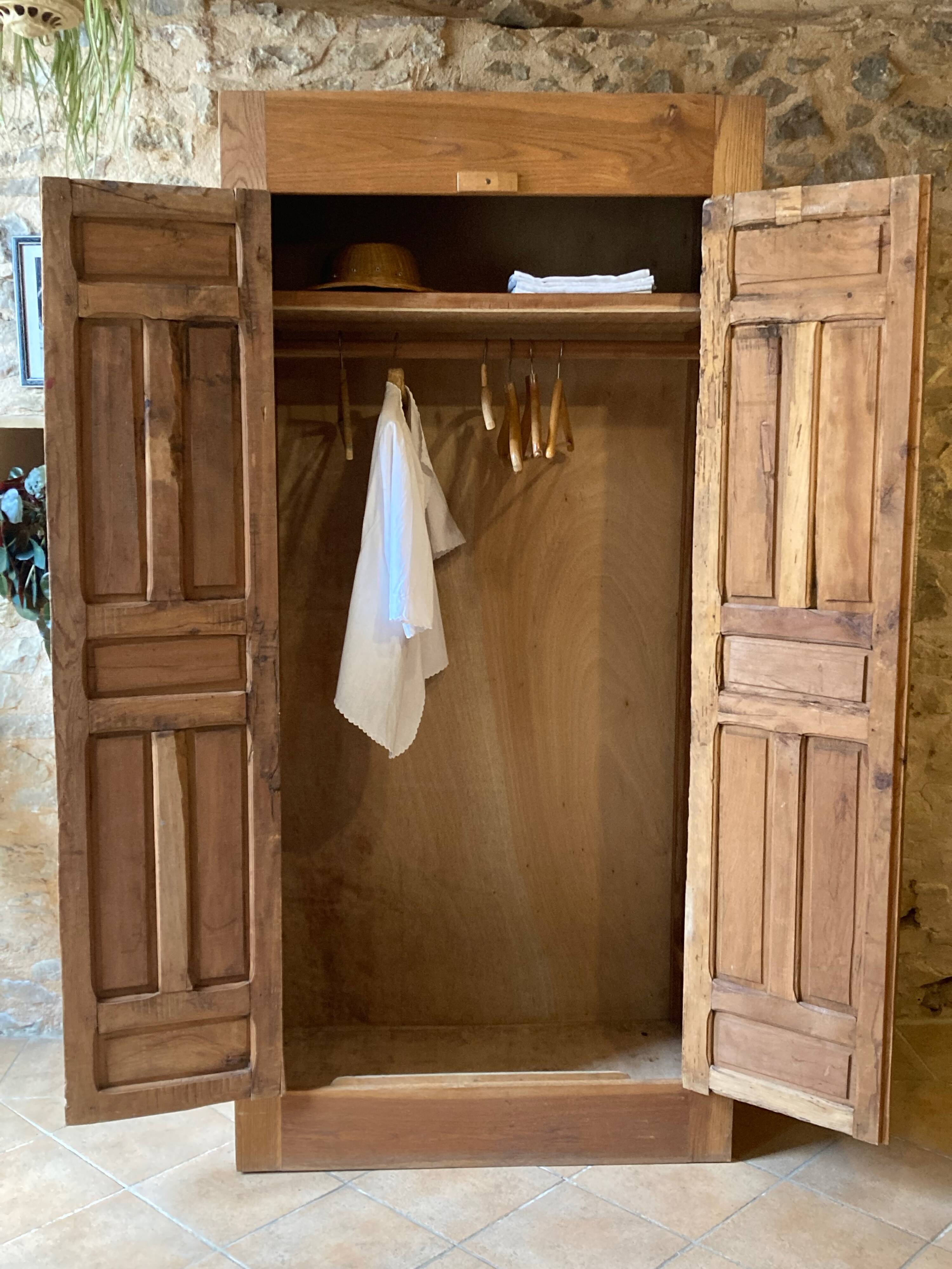 Wardrobe with exotic carved doors