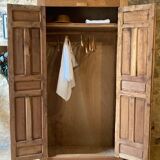 Wardrobe with exotic carved doors