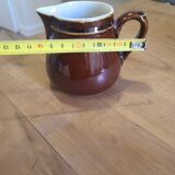 Brown ceramic milk jug