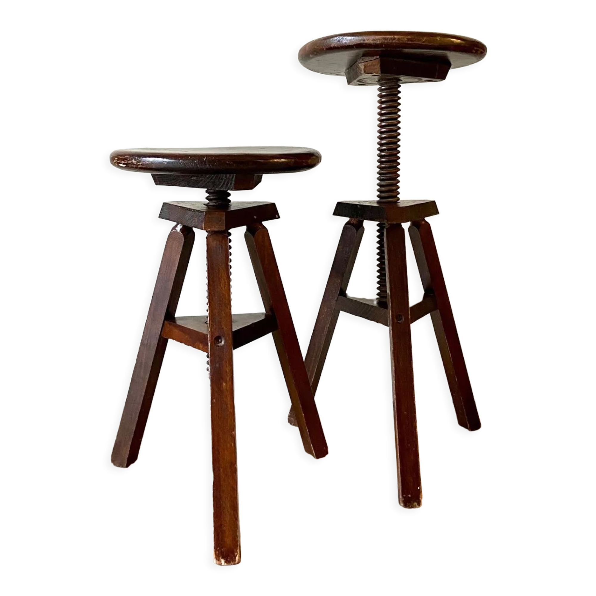 2 tripod stools with dark wood screws