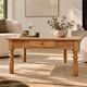Antique coffee table in solid elm with turned legs.