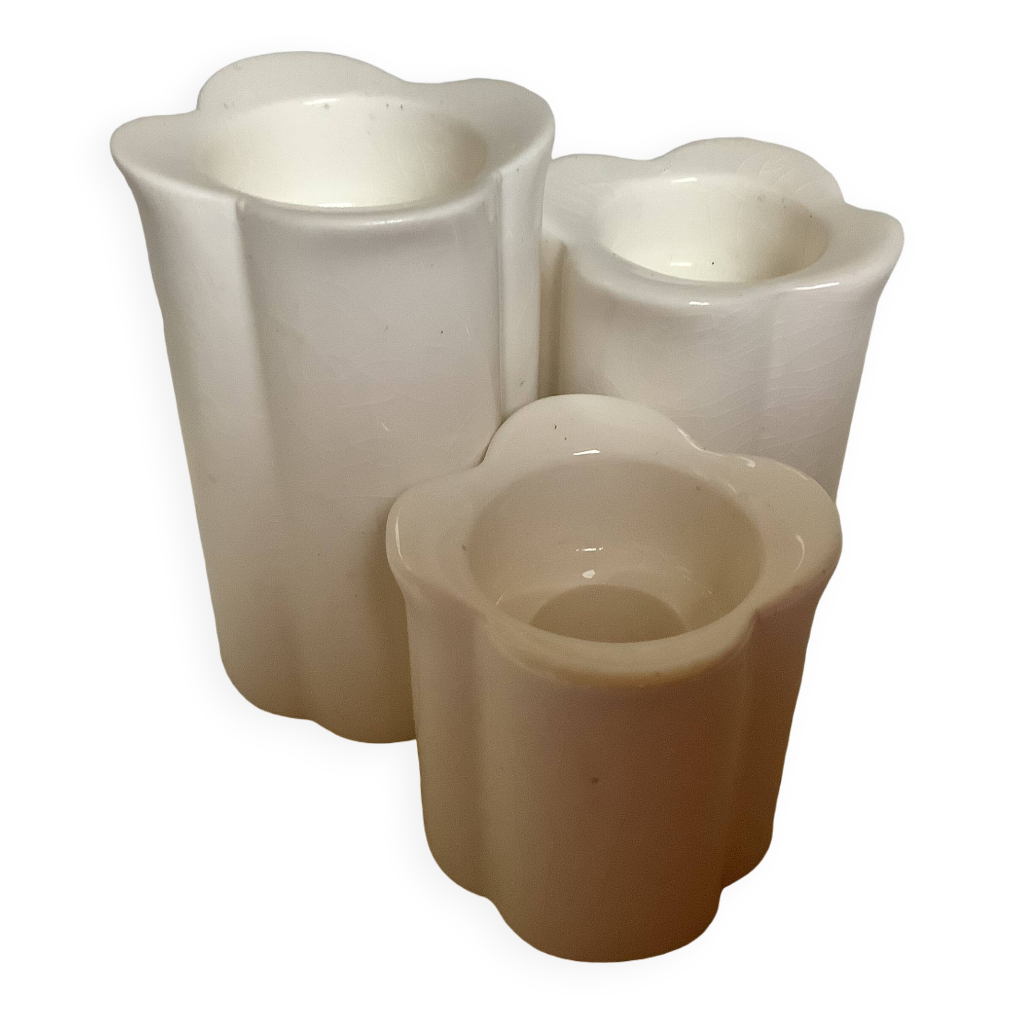 Trio of four-leaf clover candle holders