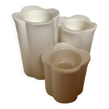 Trio of four-leaf clover candle holders