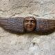Carved wooden angel head