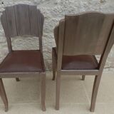 Two restyled leather-style chairs with nails