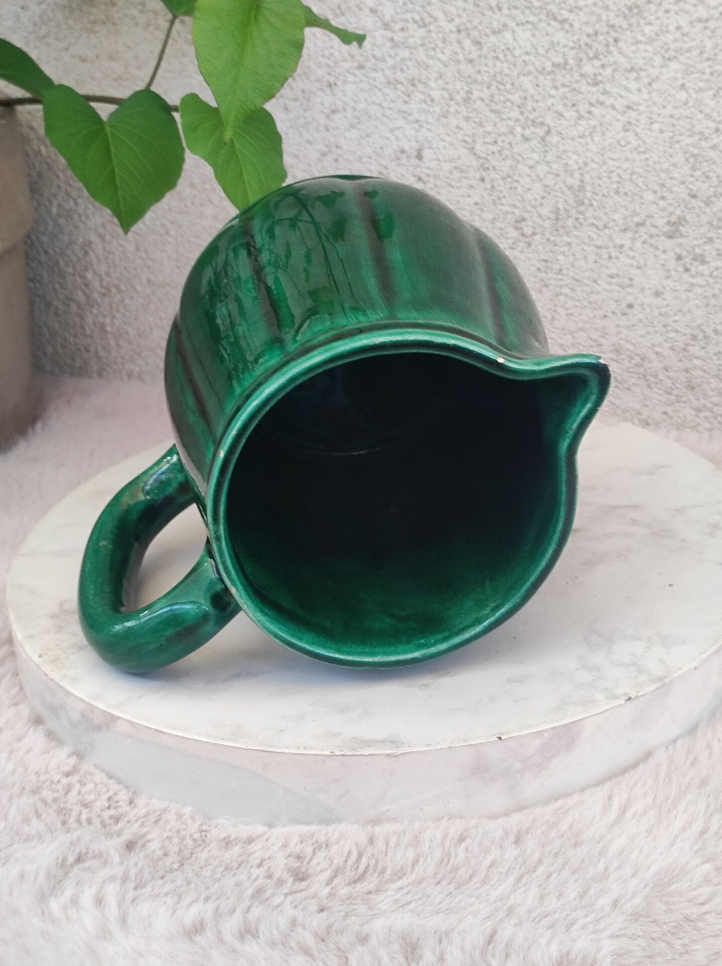Old green jug