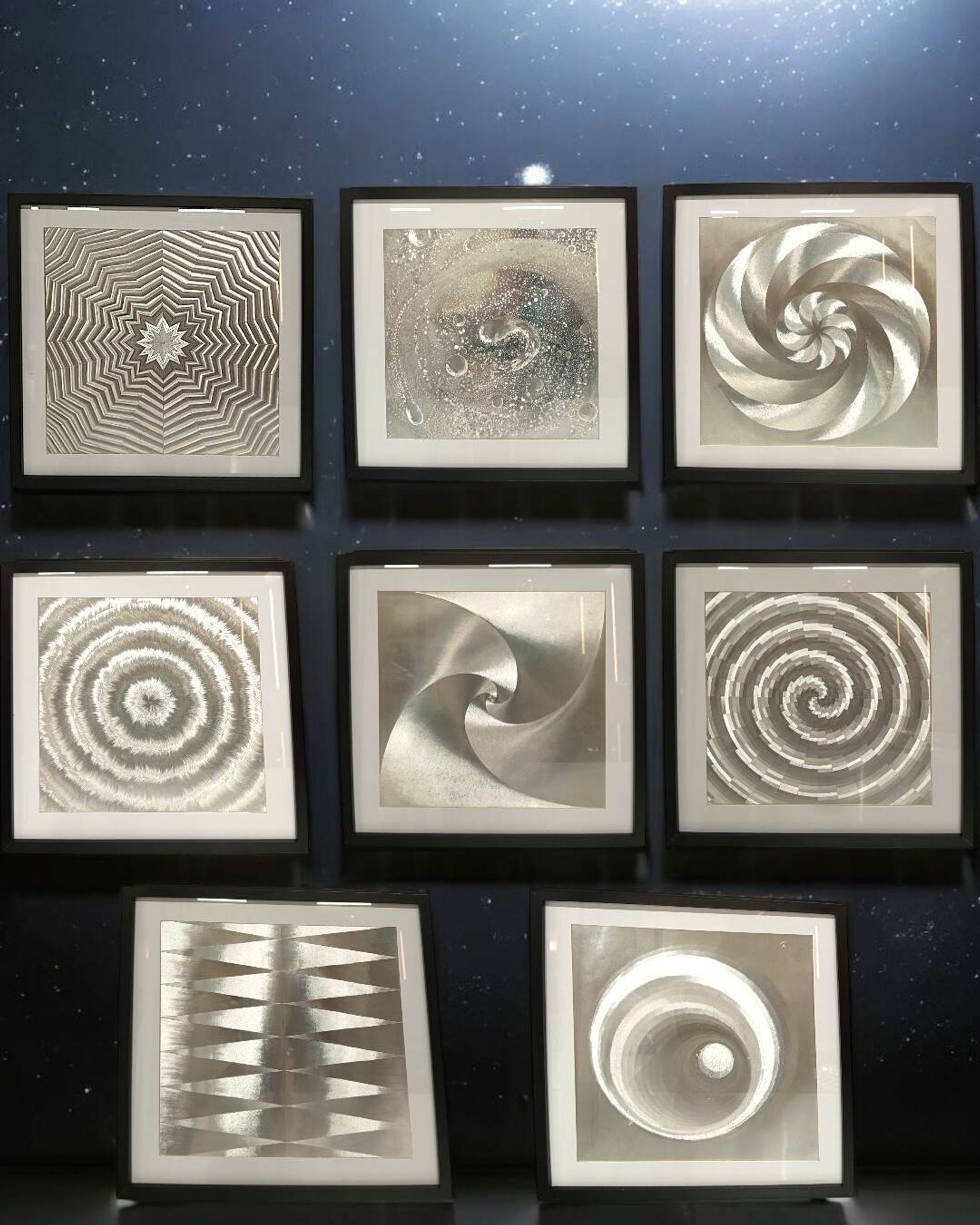 a Kinetic Op Art Aluchromy under glass frame.