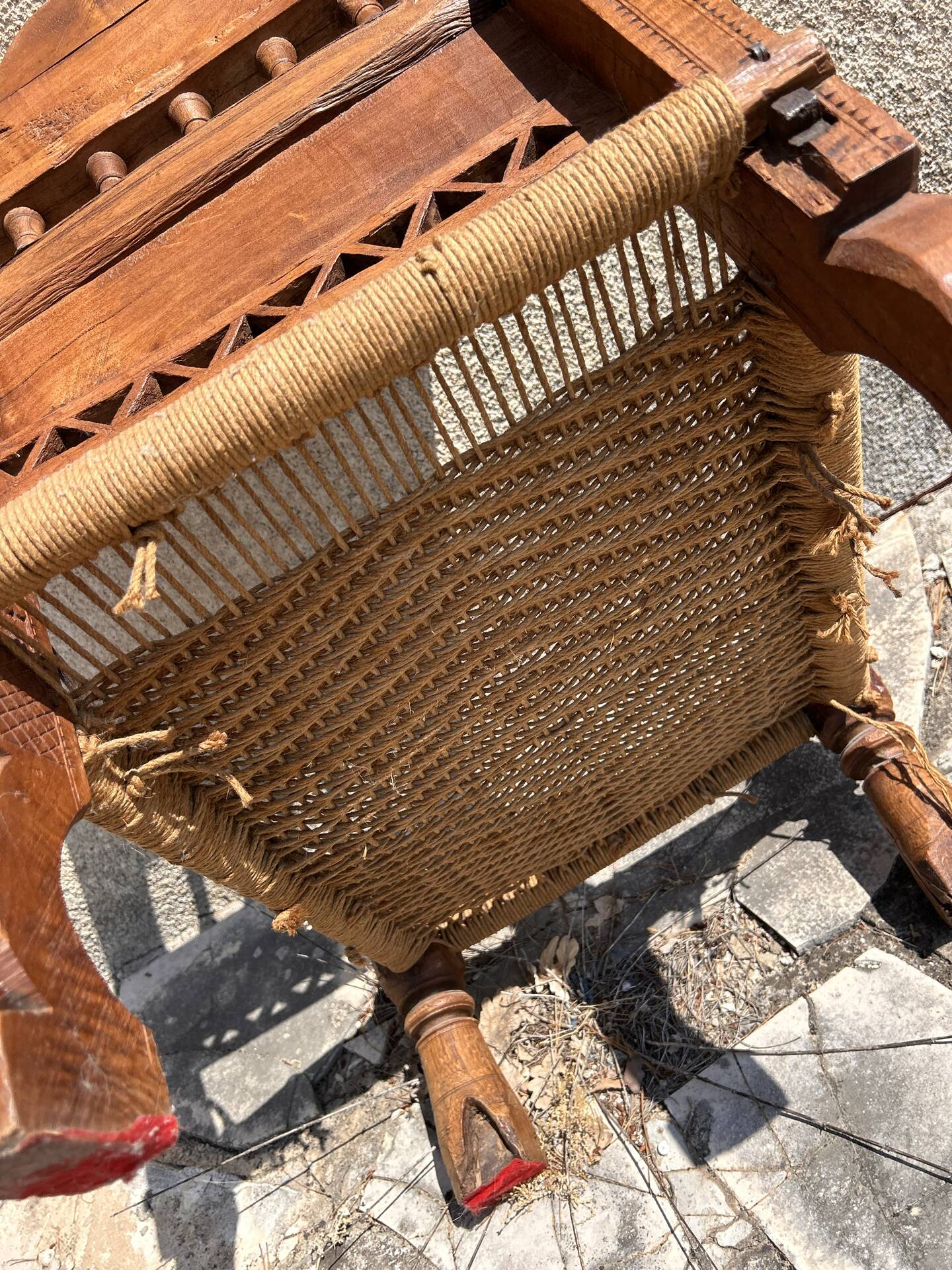 Antique ethnic chair in carved wood