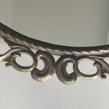 Antique oval mirror in Baroque/Rococo style. Made of gilded spelter. Dimensions: 42 x 31 cm
