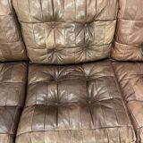 Living room sofa and brutalist armchairs in leather and wood, 70s, chalet style