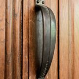 Old solid wood wardrobe with three vintage mirror doors