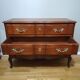 Commode arbalète trois tiroirs en merisier