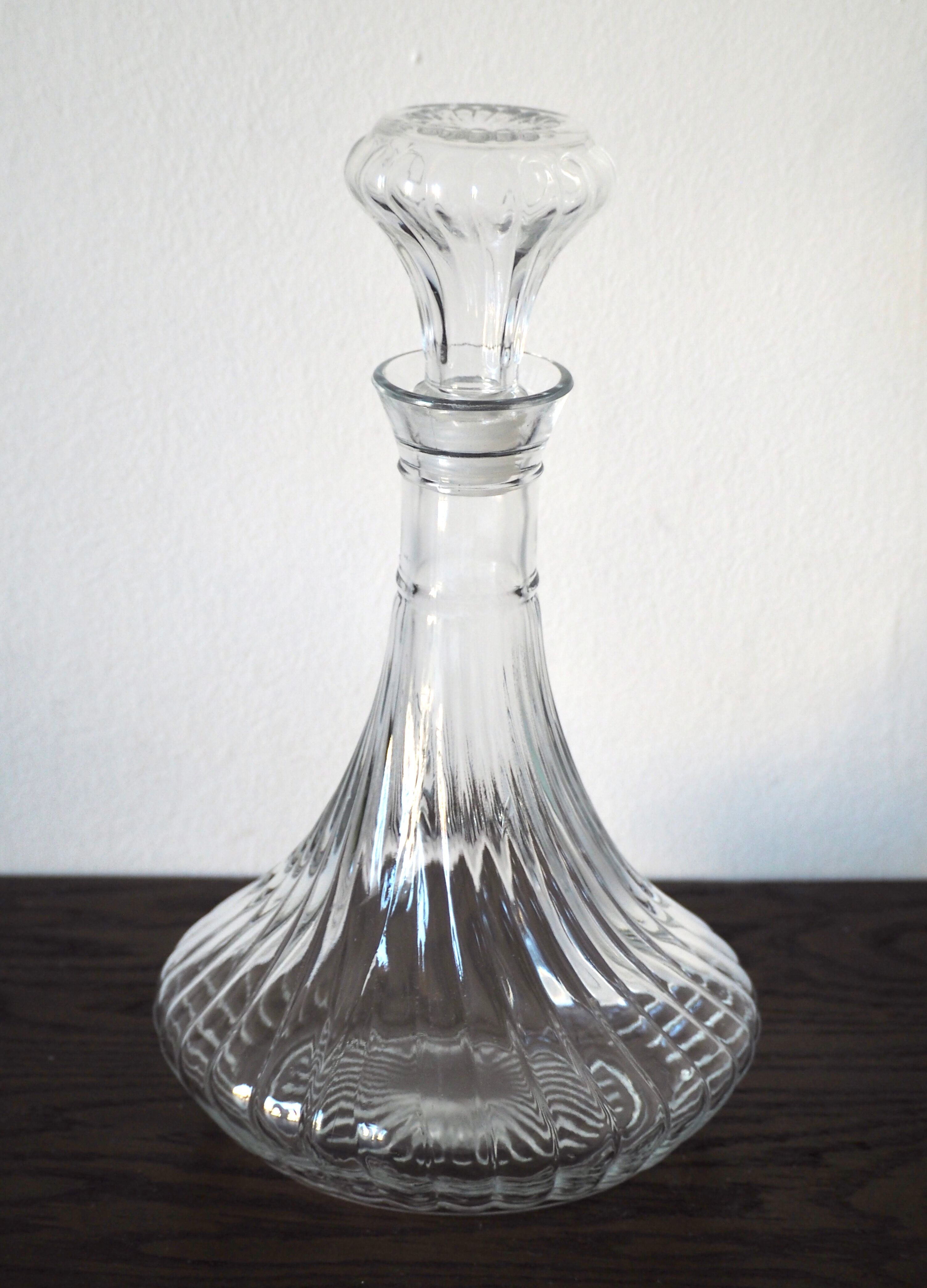 Scrolled glass wine decanter