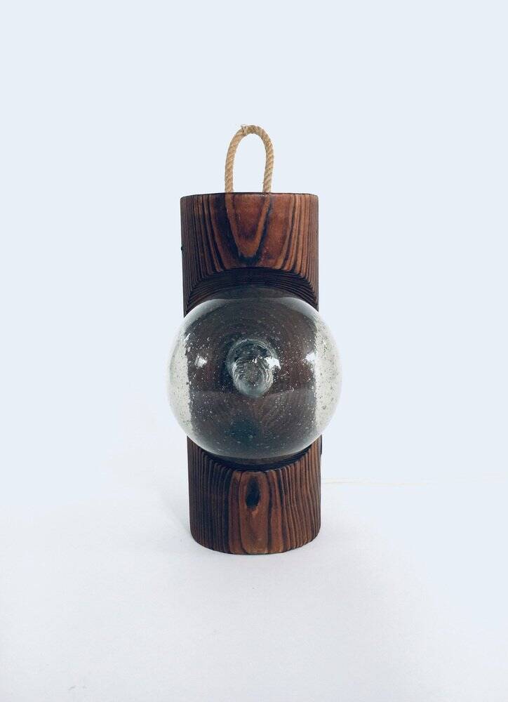 Brutalist wooden table or wall lamp attributed to Temde Leuchten, Switzerland, 1960s.