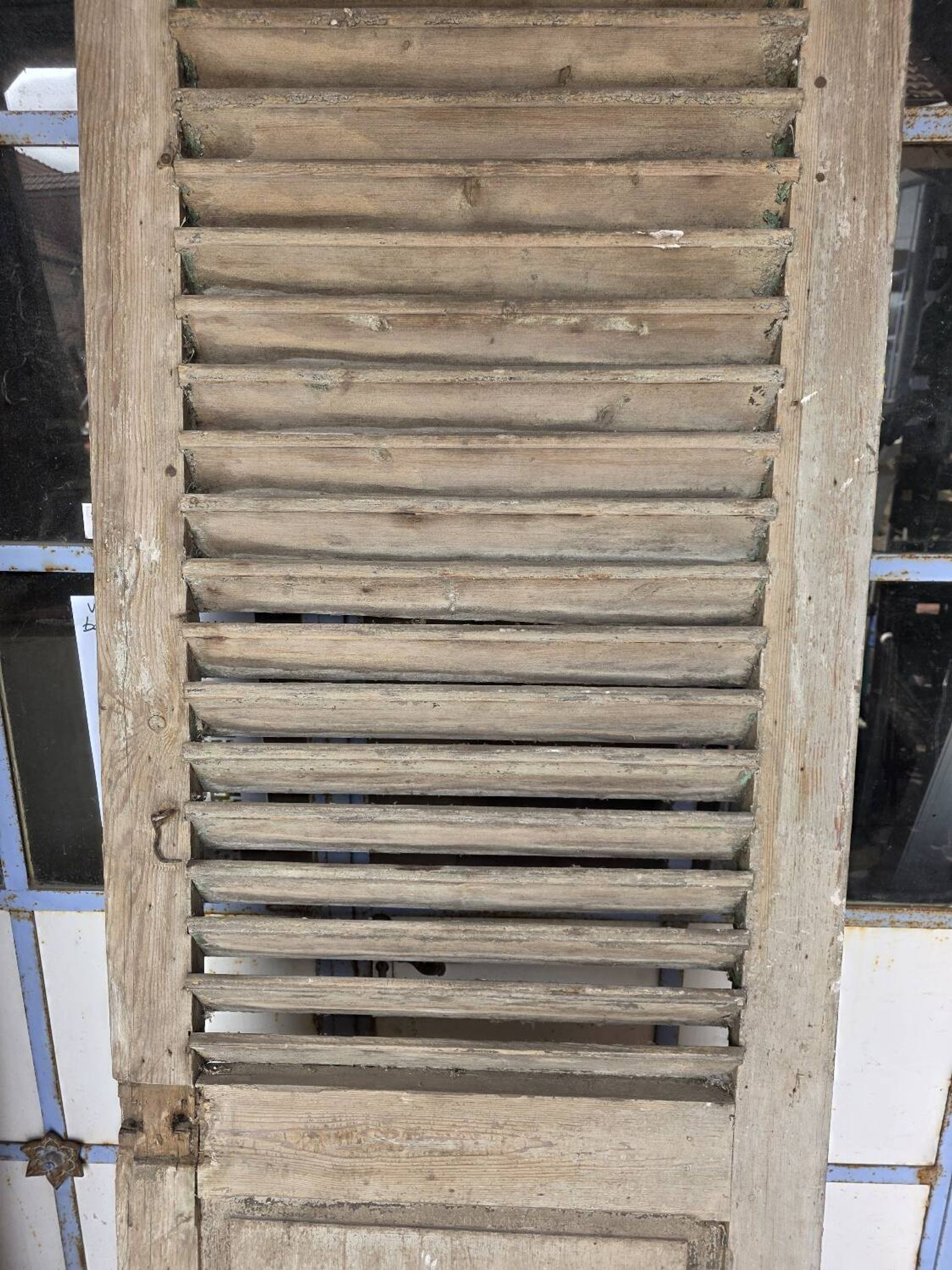 Old fir shuttered door