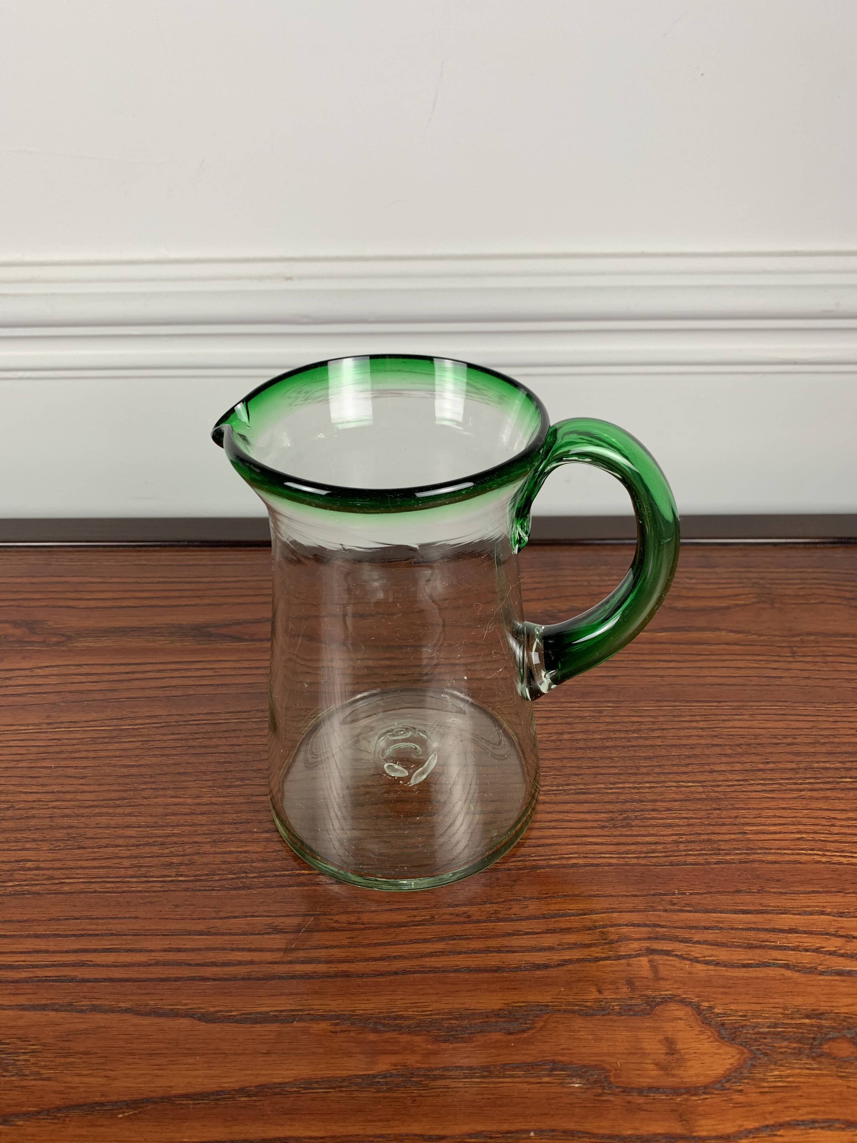 Vintage blown glass jug, green border