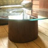 Antique hand carved mortar coffee table with circular glass top