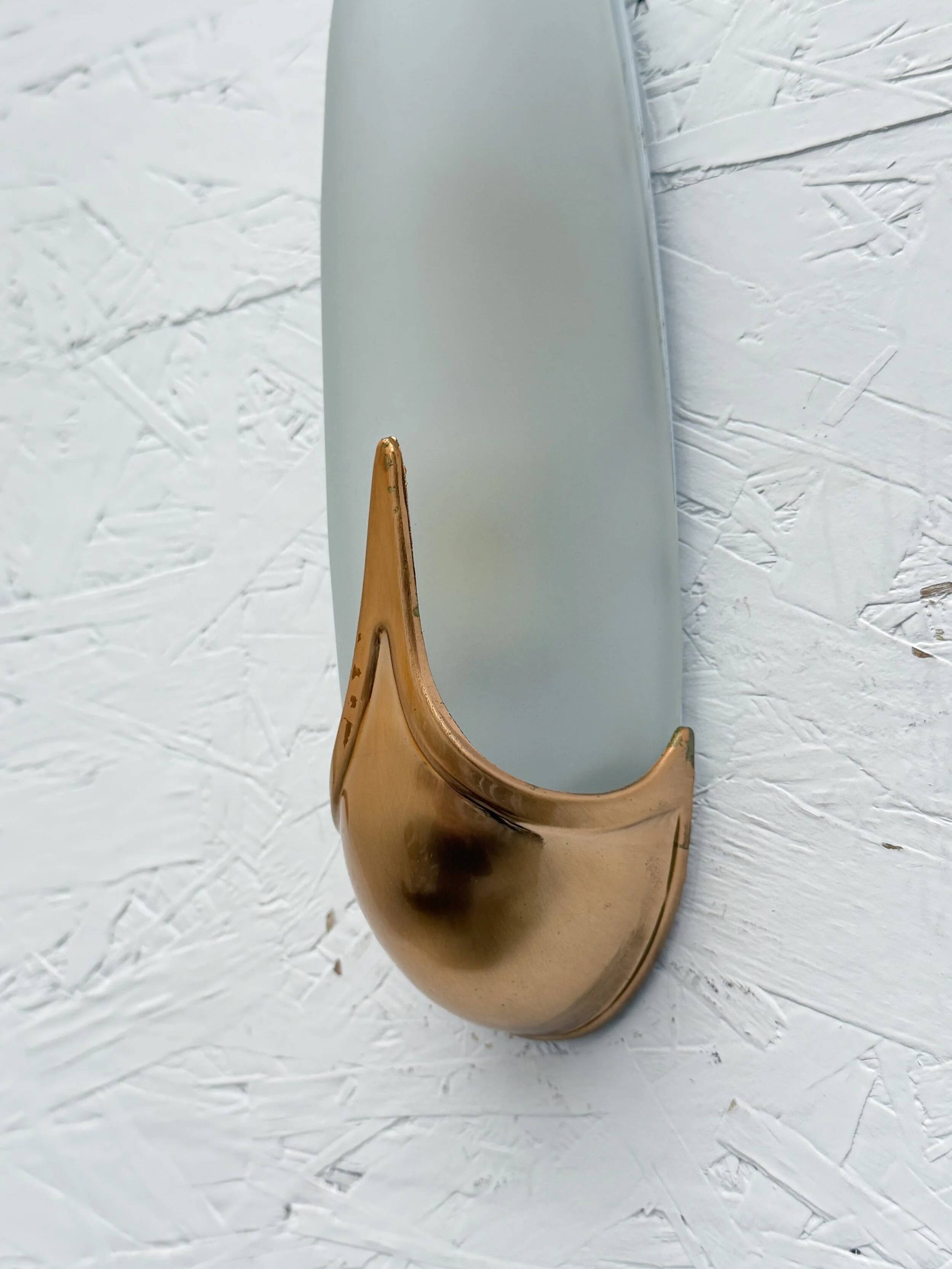 Pair of brass and opaline wall lights, Italy 1980.