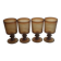 Set of four thick amber glass stemmed glasses.