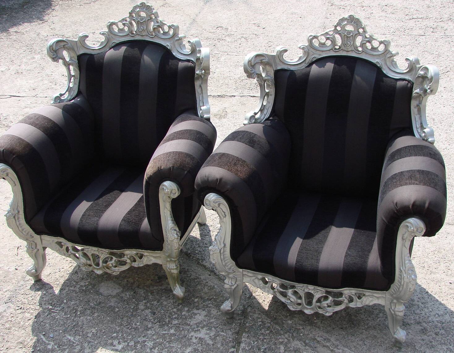 A pair of vintage armchairs, 1980s, lacquered wood and fabric