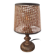 Vintage metal lamp with its caned lampshade