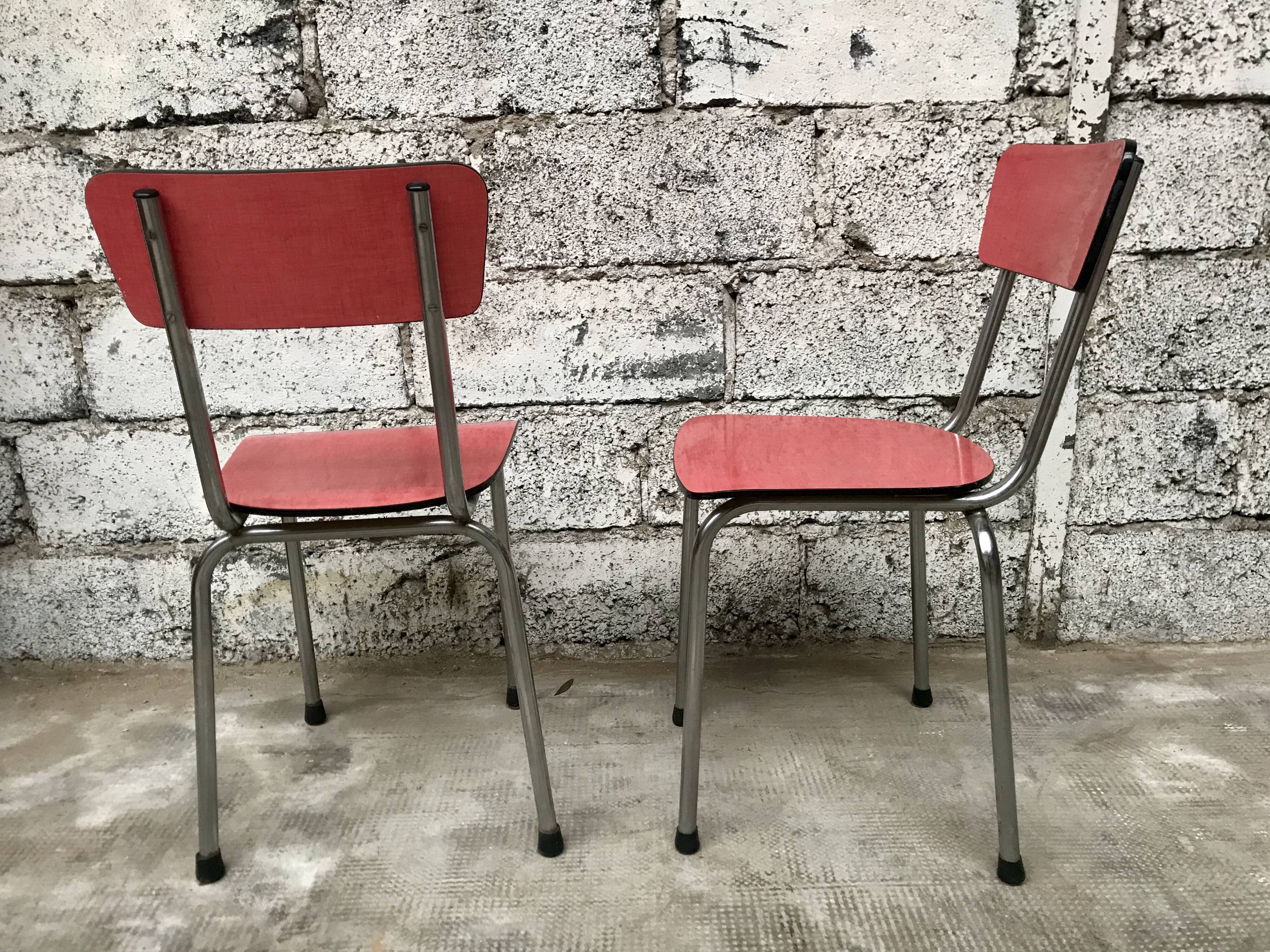 Series of 4 chairs in red formica and chrome 1950