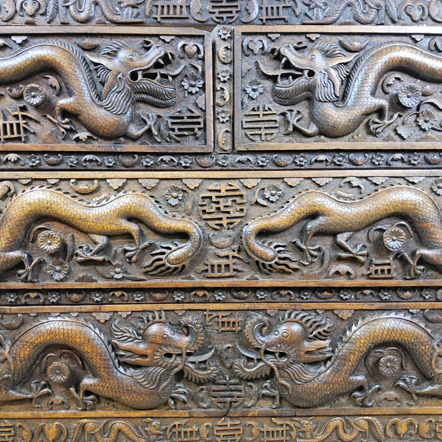 Antique 19th-century Chinese secretary with dragon woodcarving