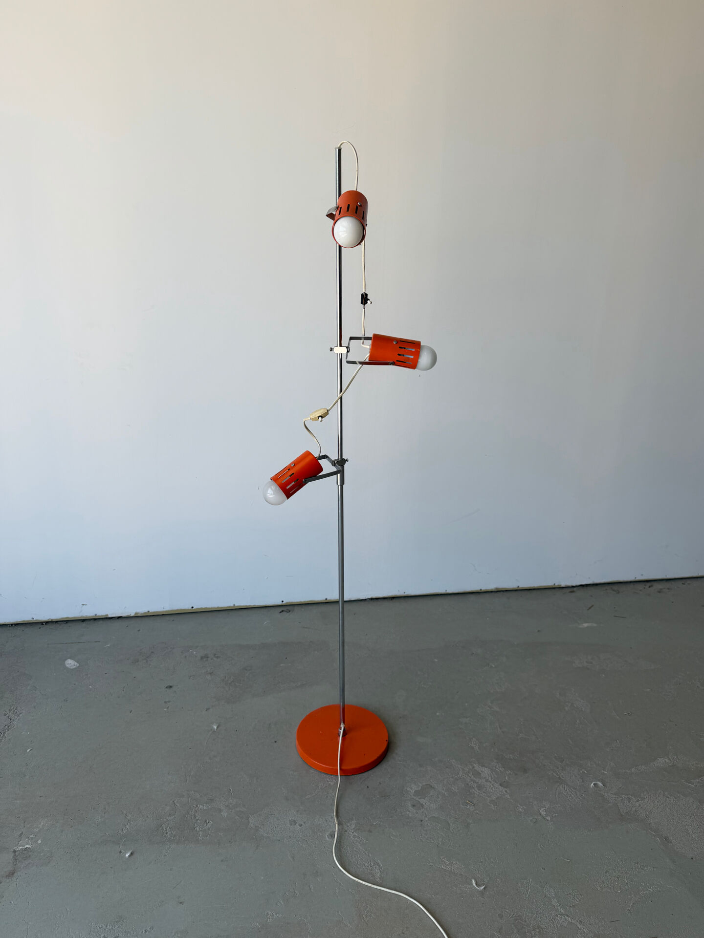 Three-spot floor lamp, Italian design, chrome and vintage orange.