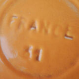 Nomar fondue service in orange cast iron