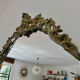 Oval mirror in gilded brass with frieze 40s 50s, 37x50 cm