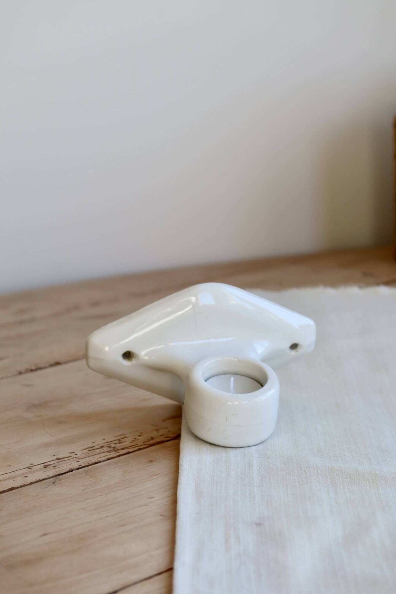 Antique wall candle holder in white porcelain